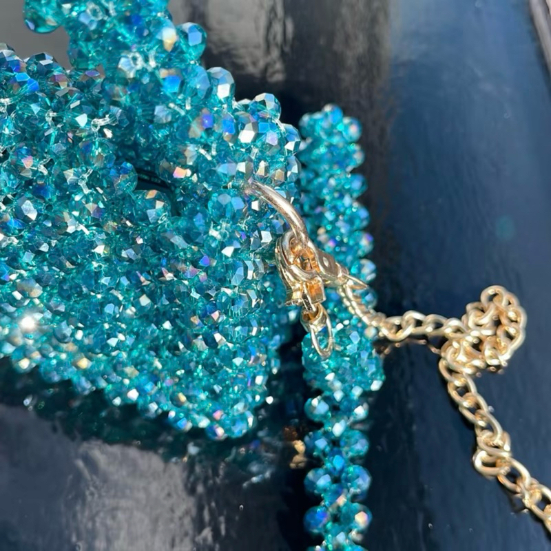 Tas manik batu kristal kaca