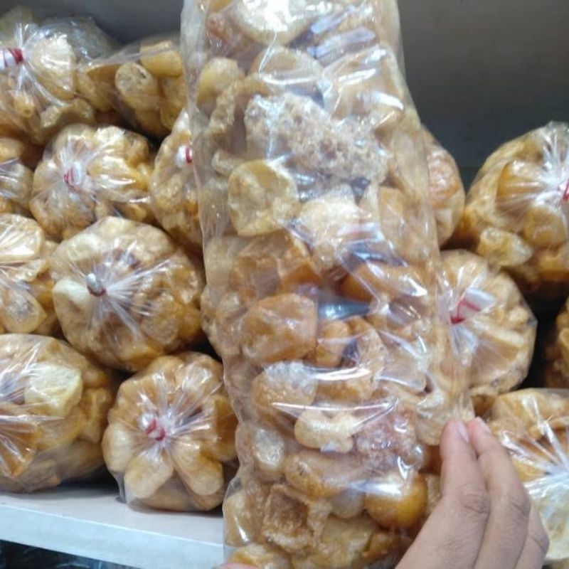 

KERUPUK JANGEK MENTAH 100 GR MAKANAN CEMILAN TRADISIONAL MINANGKABAU