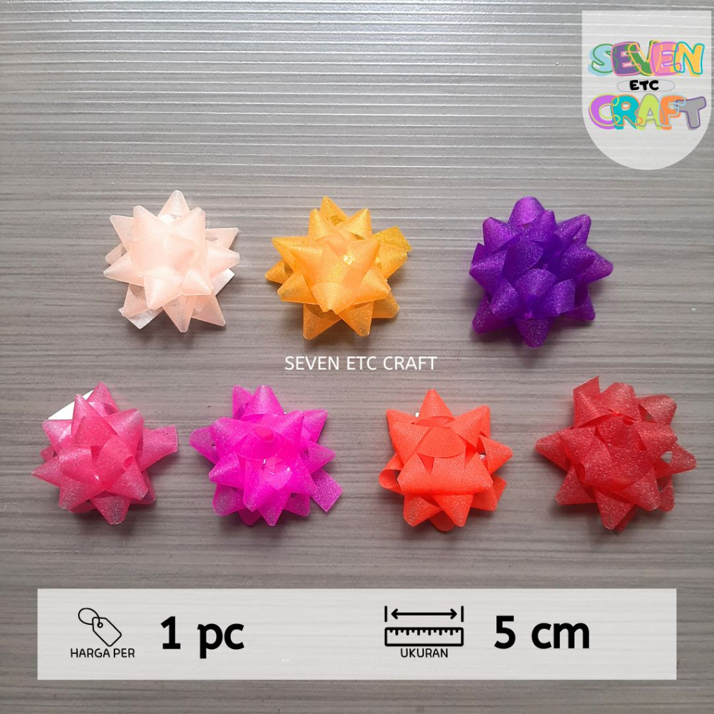 

Pita Kado Bunga Glitter Bening 5 cm