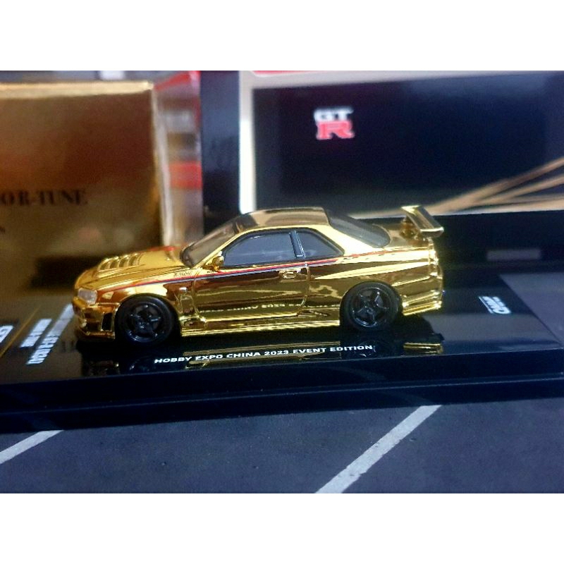 Diecast Inno64 Nissan Skyline GTR R34 Nismo  R Tune gold Chrome