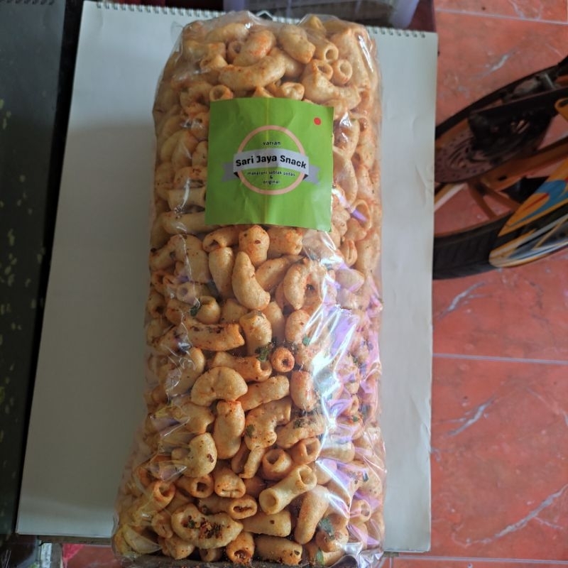 

Makaroni mekar pedas manis daun jeruk 1kg