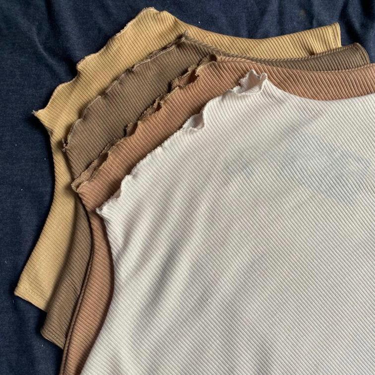 Inner Knit Turtleneck Tanpa lengan Wanita