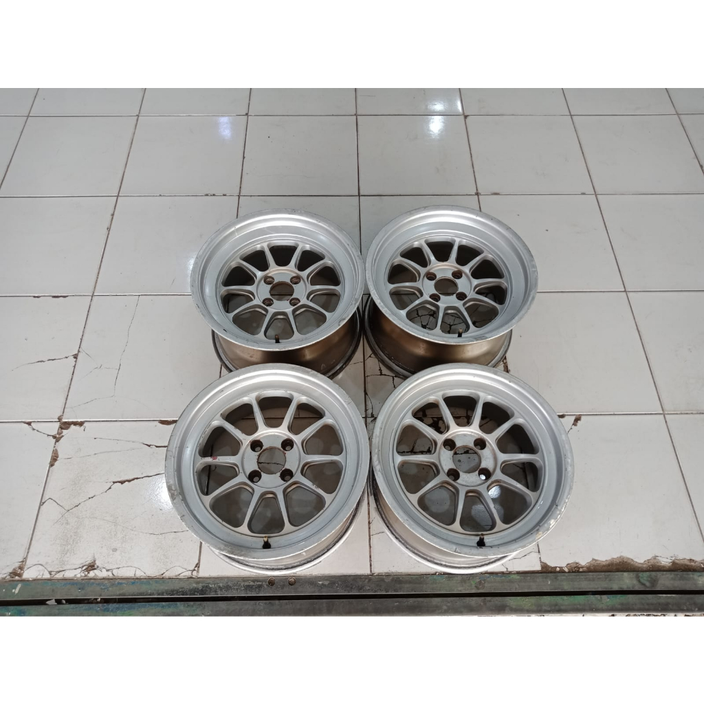 pelek mobil seken rays f1 ring 16 lebar 8/9 et 38/25 pcd 4x100 celong silver (4pcs)