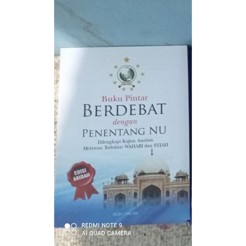 bukuNUpintarberdebatpenentangNU