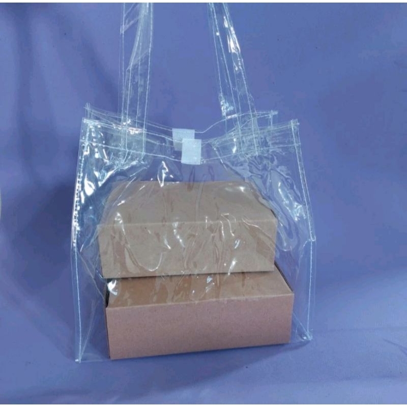 

Tas Mika Transparan Goodie Bag Souvenir Hampers Ukuran 20×15×20