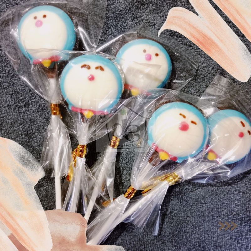 

coklat karakter lolipop doraemon jajanan anak lucu murah