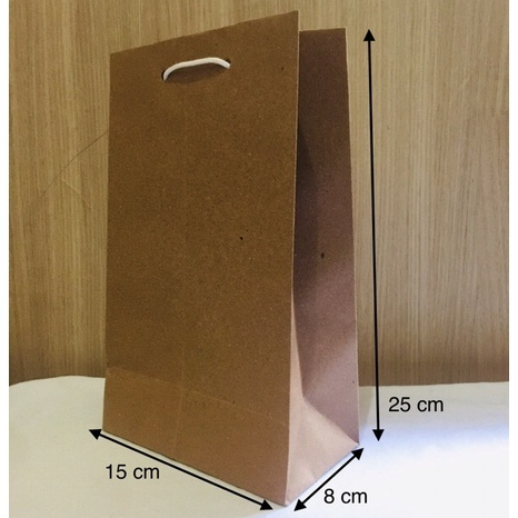 

Paper bag polos coklat wafer size 15 x 8 x 25 (PxLxT)