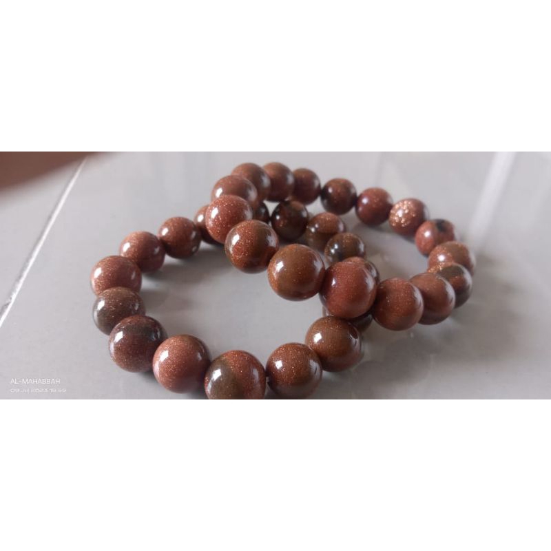 gelang batu pasir emas