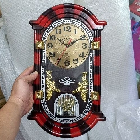 jam dinding esa bunyi tiap jam bandul berputar