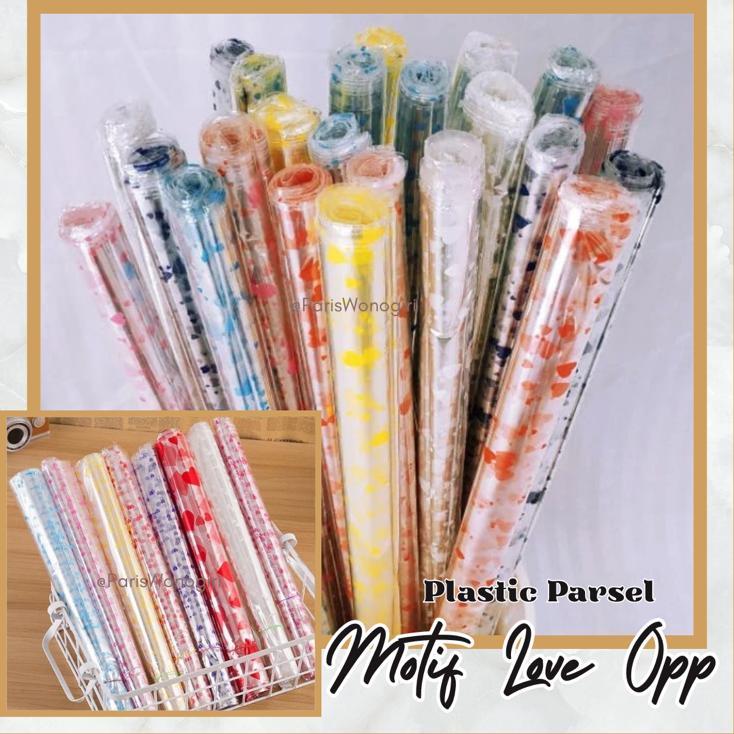 

PLASTIK PARSEL PEMBUNGKUS KADO MOTIF LOVE OPP WRAPPING PAPER / PLASTIK SNACK / PLASTIK TRANSPARAN / PLASTIK BONEKA