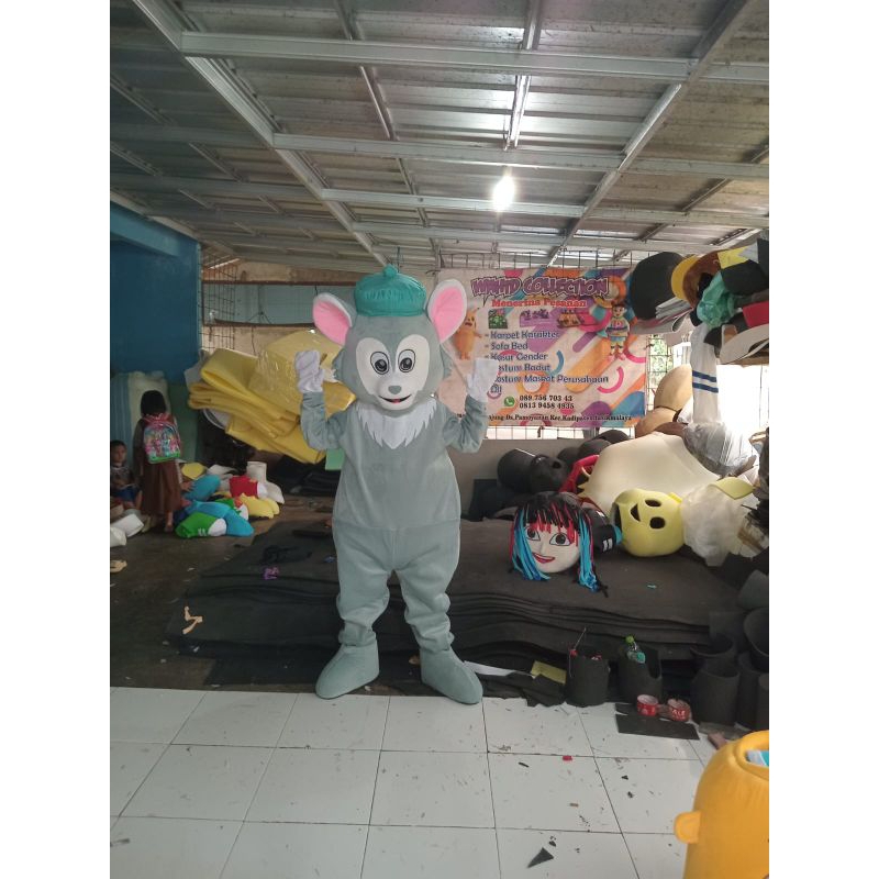 Kostum badut tom pay