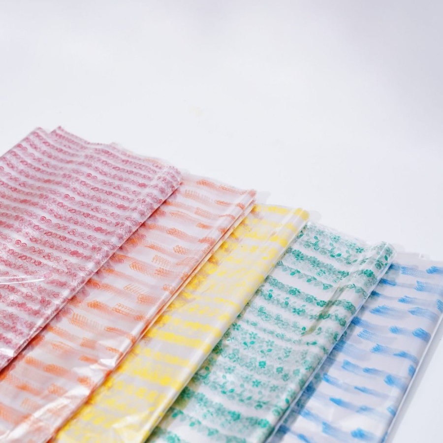 

Plastik totol per pack isi 60 lembar Ukuran 24 x 45