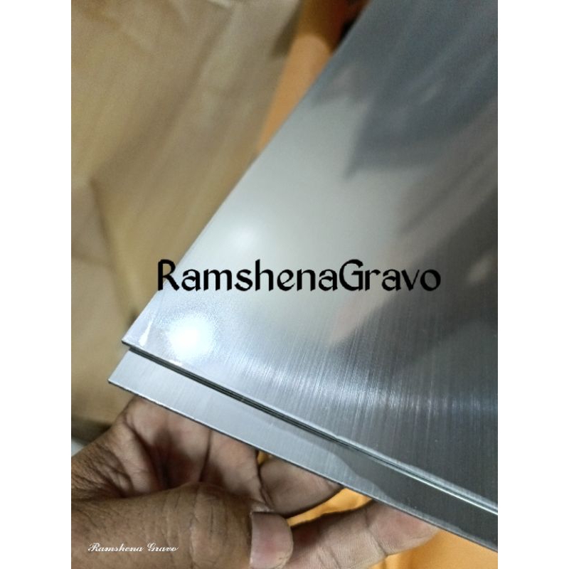 

gravoply silver/laser/router/bahan name tag/hairline/60x120cm tebal 1.5mm