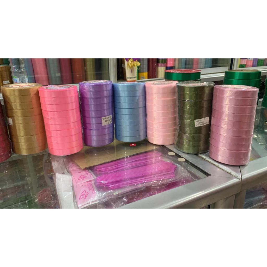 

Pita kain ukuran ½ inch