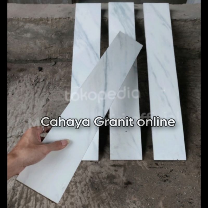 Granit list plint ukuran 10x60 pinggiran keramik putih motif Matera white sunpower kw1
