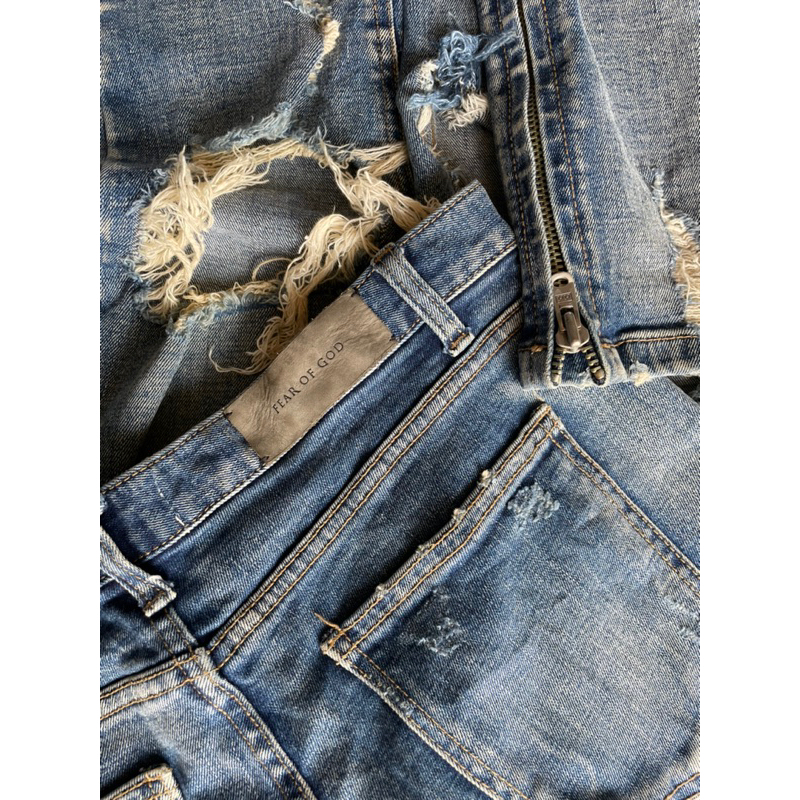 fear of god distressed ripped jeans