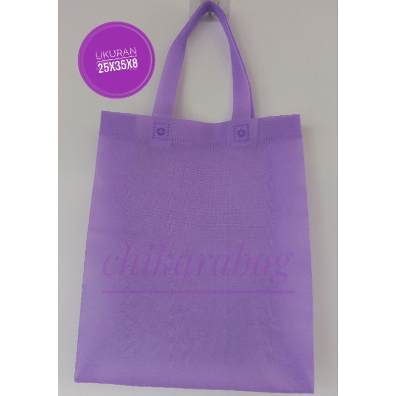 

iDk90 (12 PCS) TAS SOUVENIR SPUNBOND STANDING HANDLE BAG ukuran 25 x 35 x8 KETEBALAN 75 GSM