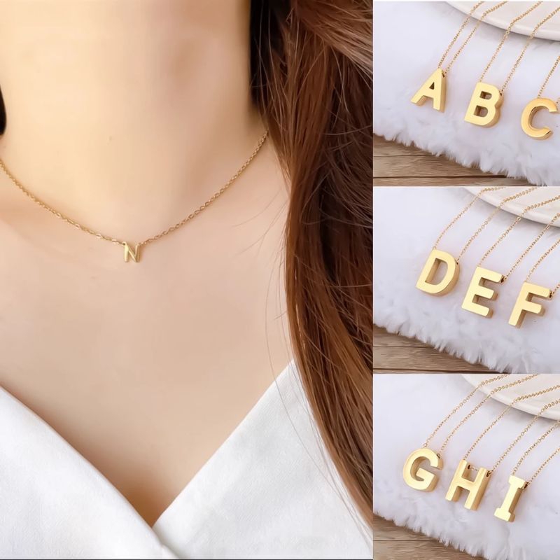 Kalung Titanium Pria & Wanita Liontin Huruf A-Z Warna Gold