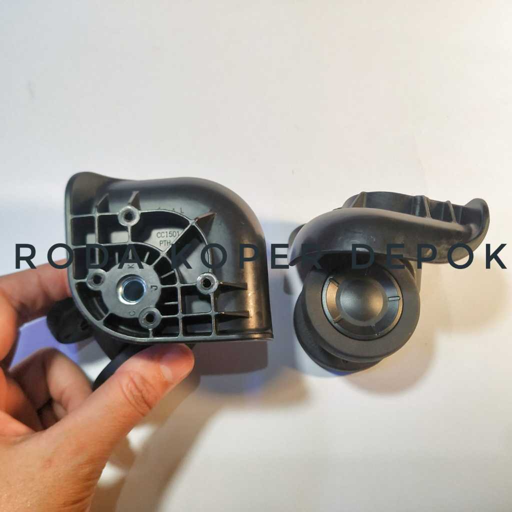 Dudukan roda koper merk bagasi