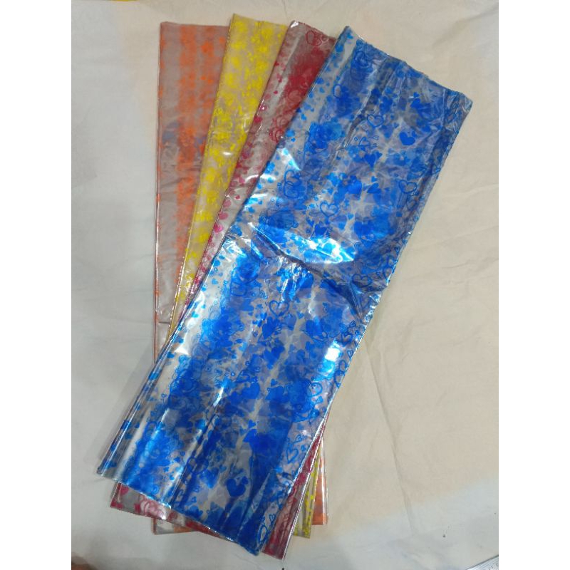 

plastik parsel motif 64x79cm (isi10 lembar)