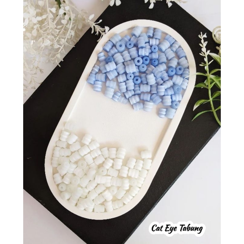 Batu cat eye kapsul / Batu Cat eye tabung 21.500/15 biji