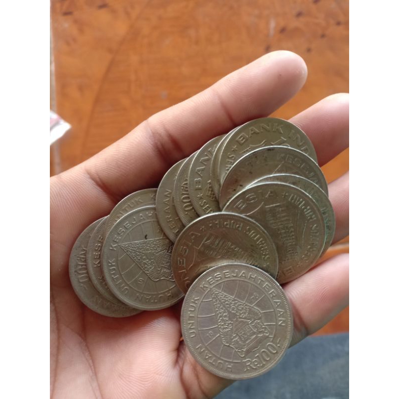 14 koin Temukan UANG KOIN 100 RUPIAH TIPIS GAMBAR WAYANG & RUMAH GADANG Tahun 1978