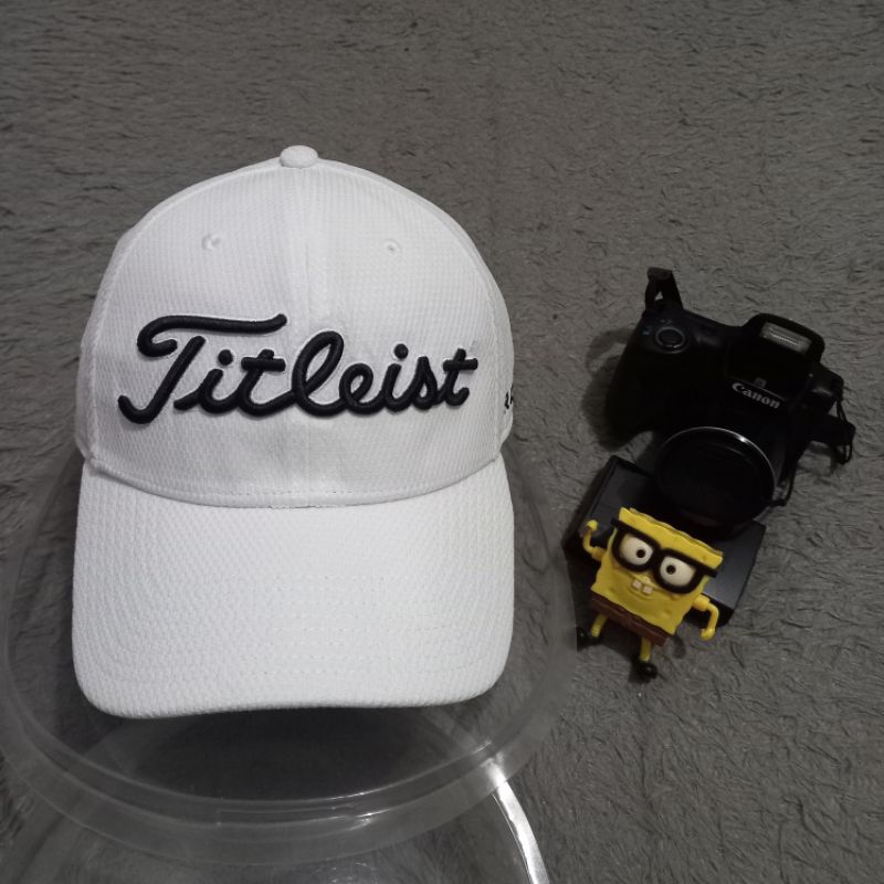 Topi golf titleist bilup original foto sendiri