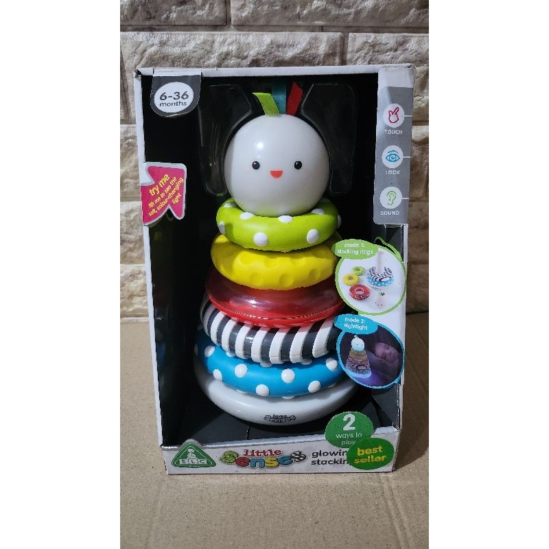 ELC Little Senses Glowing Stacking Rings - Mainan Aktivitas Ring Donat Anak