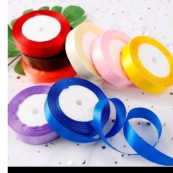 

pita satin 3/4 = 2cm, panjang 20-25 yard per roll