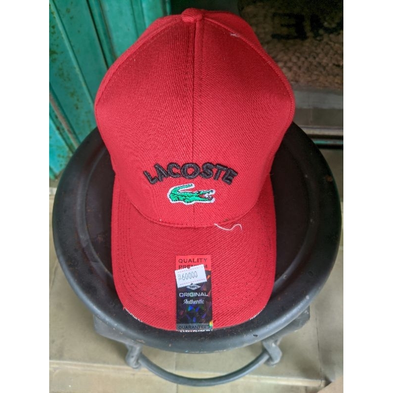 Topi Lacoste