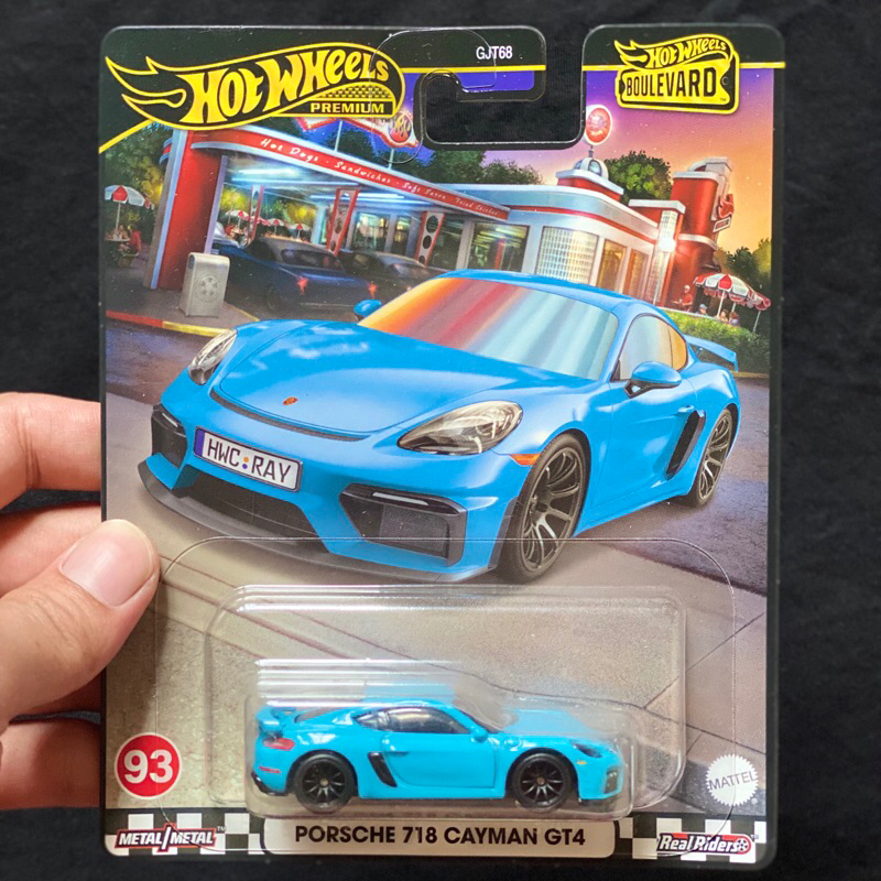 hotwheels Porsche Cayman biru Boulevard Premium