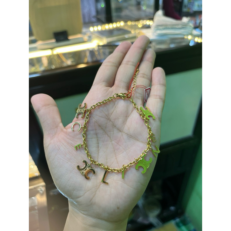 gelang titanium mainan chnel
