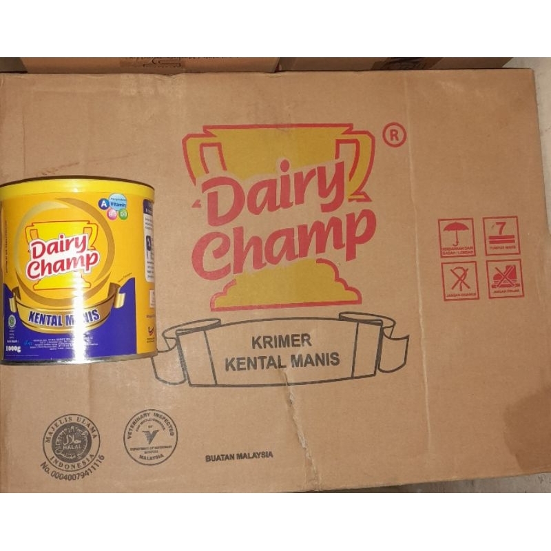 

Susu Dairy Champ kaleng 1 dus isi 24×1kg susu krimer kental manis