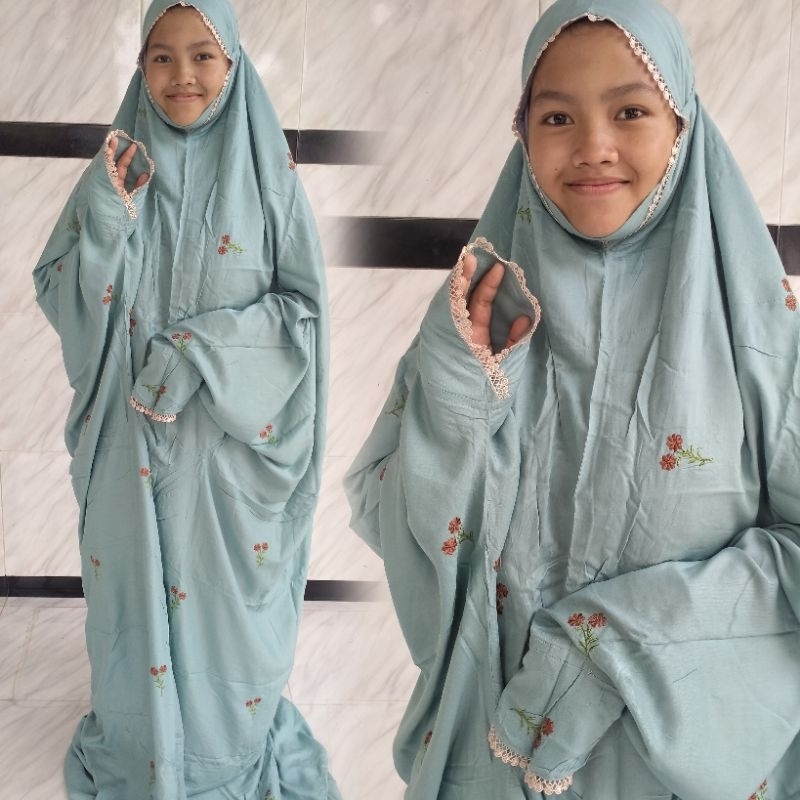 Mukena jumbo almukhtar bahan rayon seribu bunga model lajuran ukuran remaja