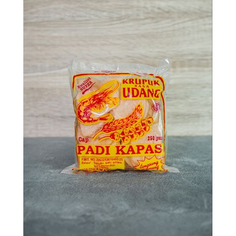 

Kerupuk Mentah Rasa Udang Cap Padi dan Kapas ukuran Sedang Kemasan 250 Gram