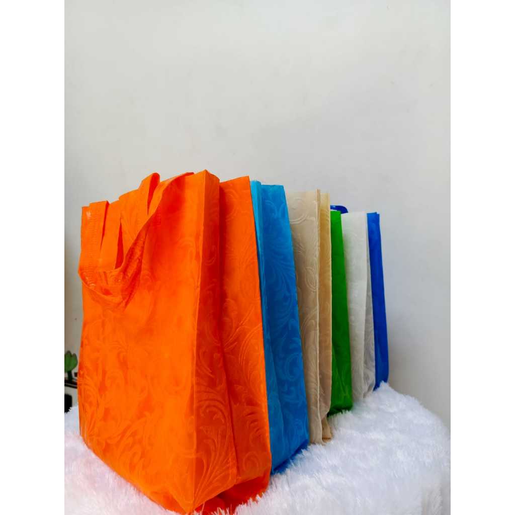

TAS TEKSTUR / EMBOS PRES T35X25X8 LIPAT SAMPING PER LUSIN ( 12 PCS )