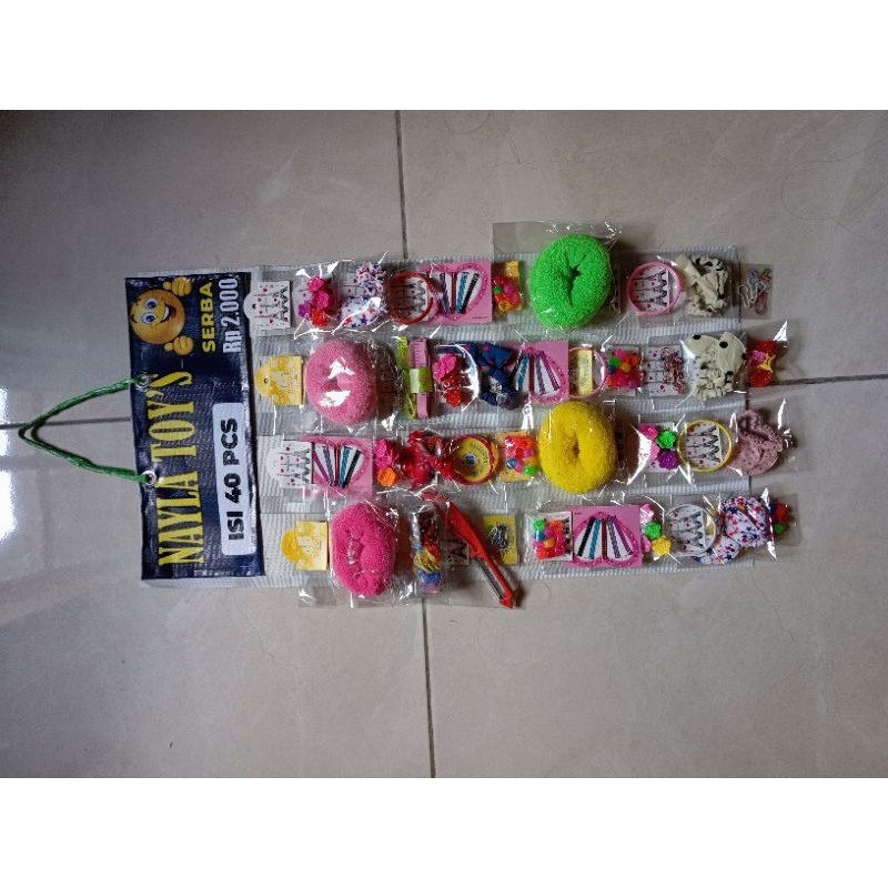 

paket usaha papan rentengan accesoris serba 2000