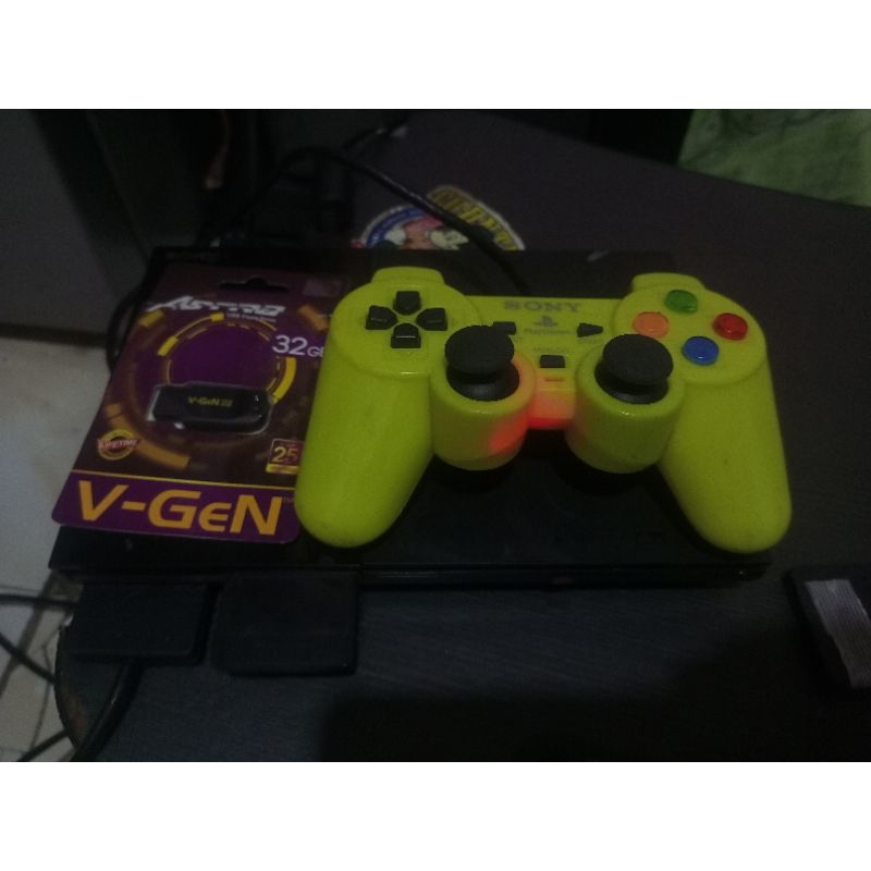 PS 2 slim seri 9 MC boot  flashdisk 32gb full game.tinggal main garansi aman