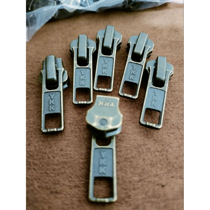 Kepala resleting YKK besi no.5 atg