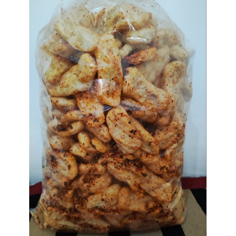 

Cuanki Lidah Cemilan kering Rasa Pedas Gurih Daun Jeruk dengan tektur renyah dan Nikmat.