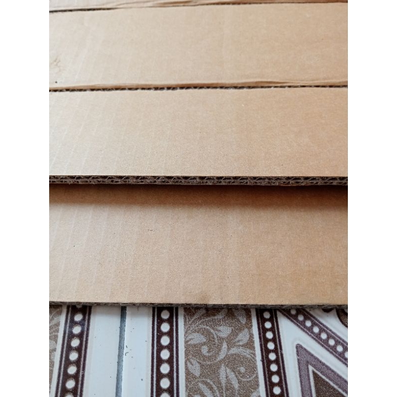 

packing kardus tebal.