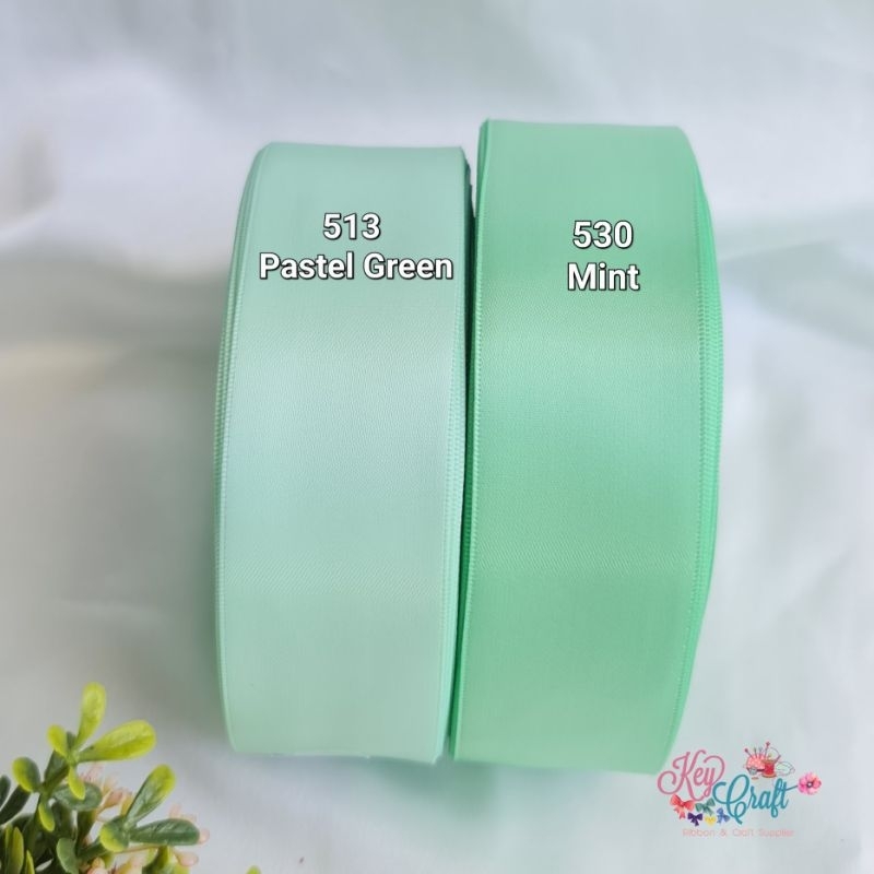 

Pita Satin Import Double side size 3,8cm warna pastel green dan Mint
