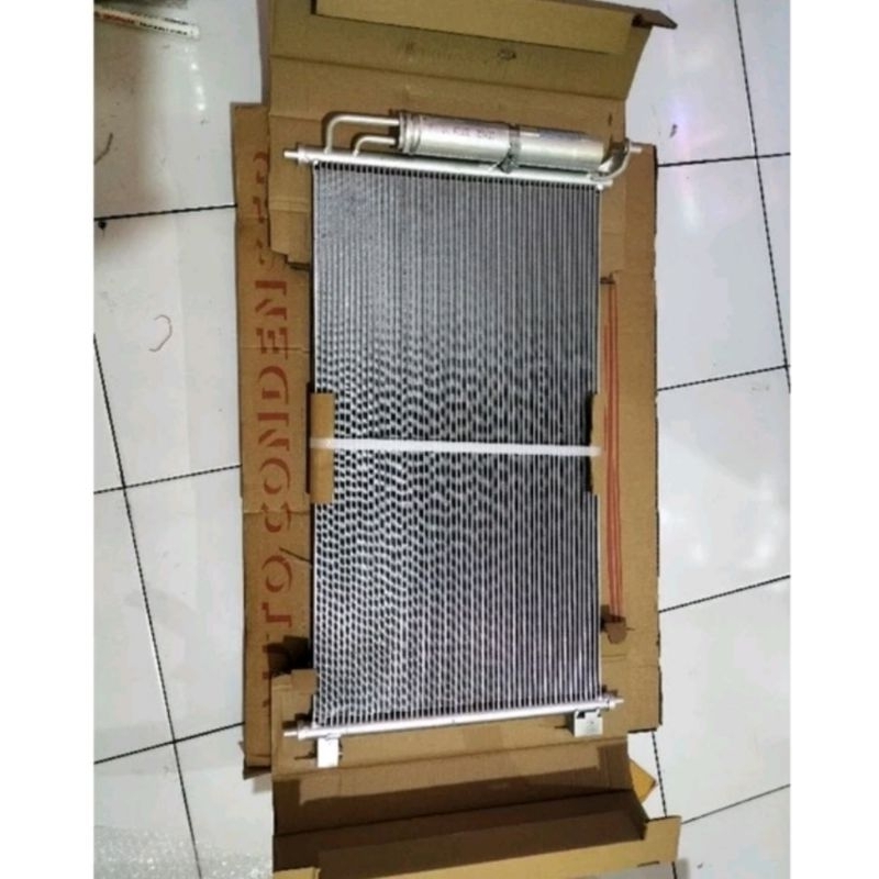 condensor AC mobil grand livina