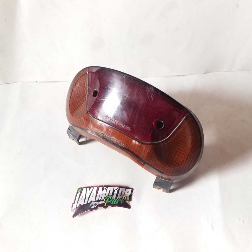 LAMPU BELAKANG LAMPU STOP LAMP STOPLAMP BELAKANG ASSY SUZUKI SATRIA LUMBA 2TAK 2 TAK ORIGINAL ORISIN