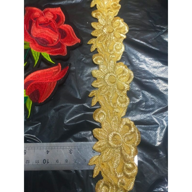 Renda bordir warna gold pinggir lebar 6 cm panjang 5 yard harga per 90 cm 12000