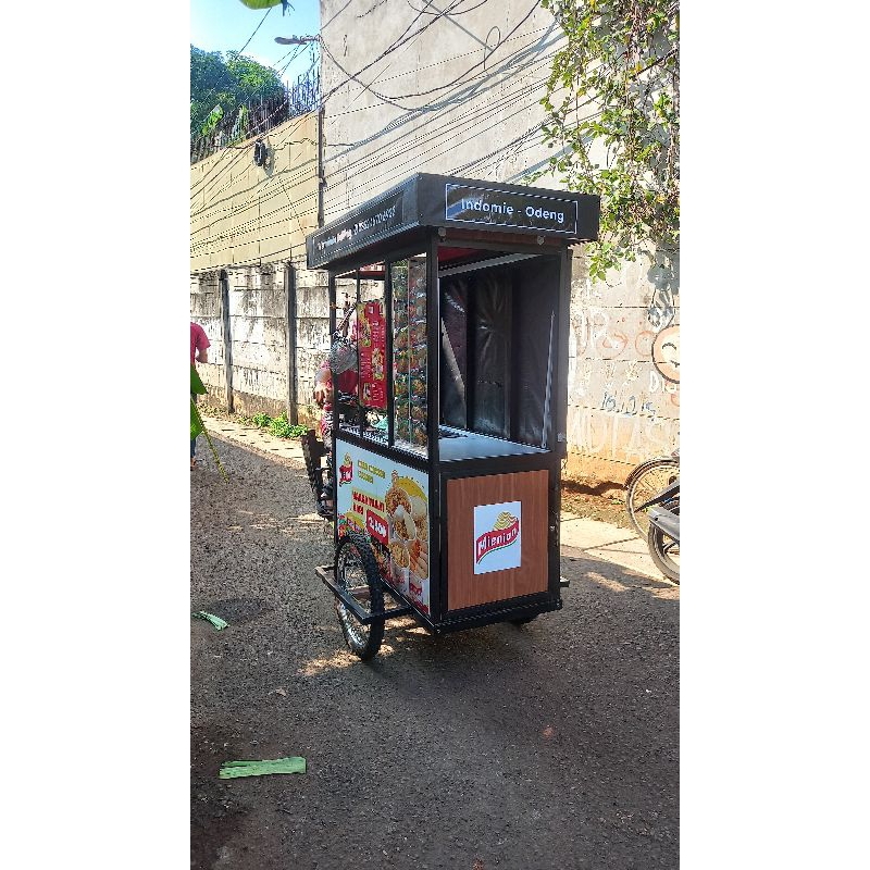 

Paket Usaha Warmindo Keliling Mienian | Gerobak Sepeda Listrik (Gelis)