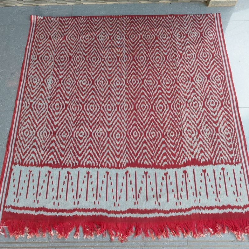 kain tenun merah bata