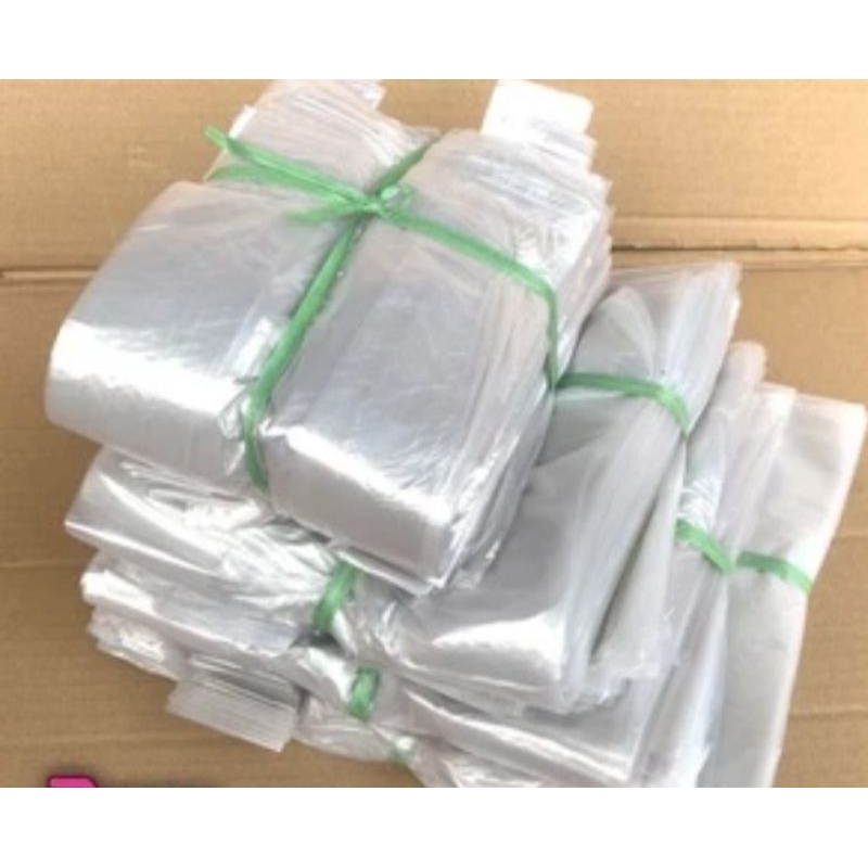 

PLASTIK KRESEK PUTIH DOP 1/2 KG KECIL
