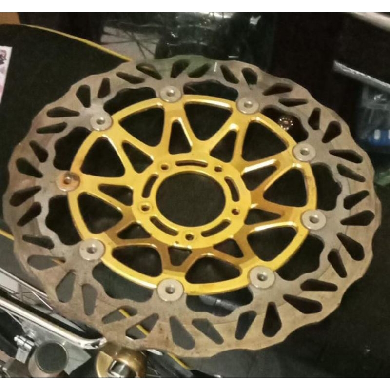 piringan cakram traction