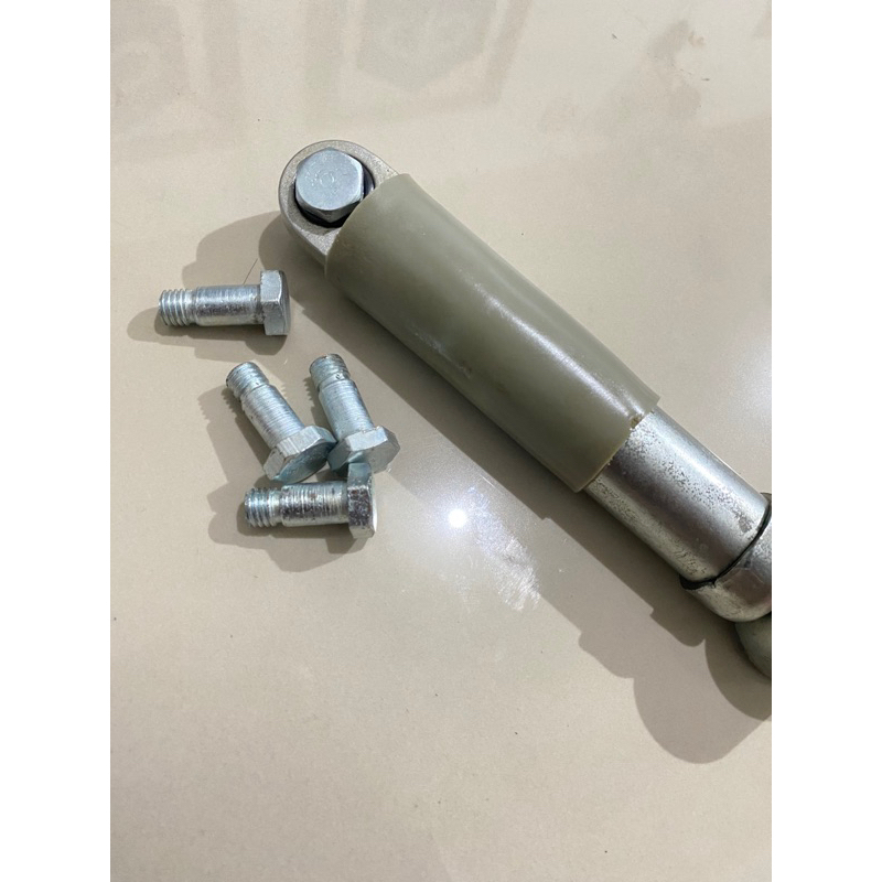 baut shock depan vespa bagian atas